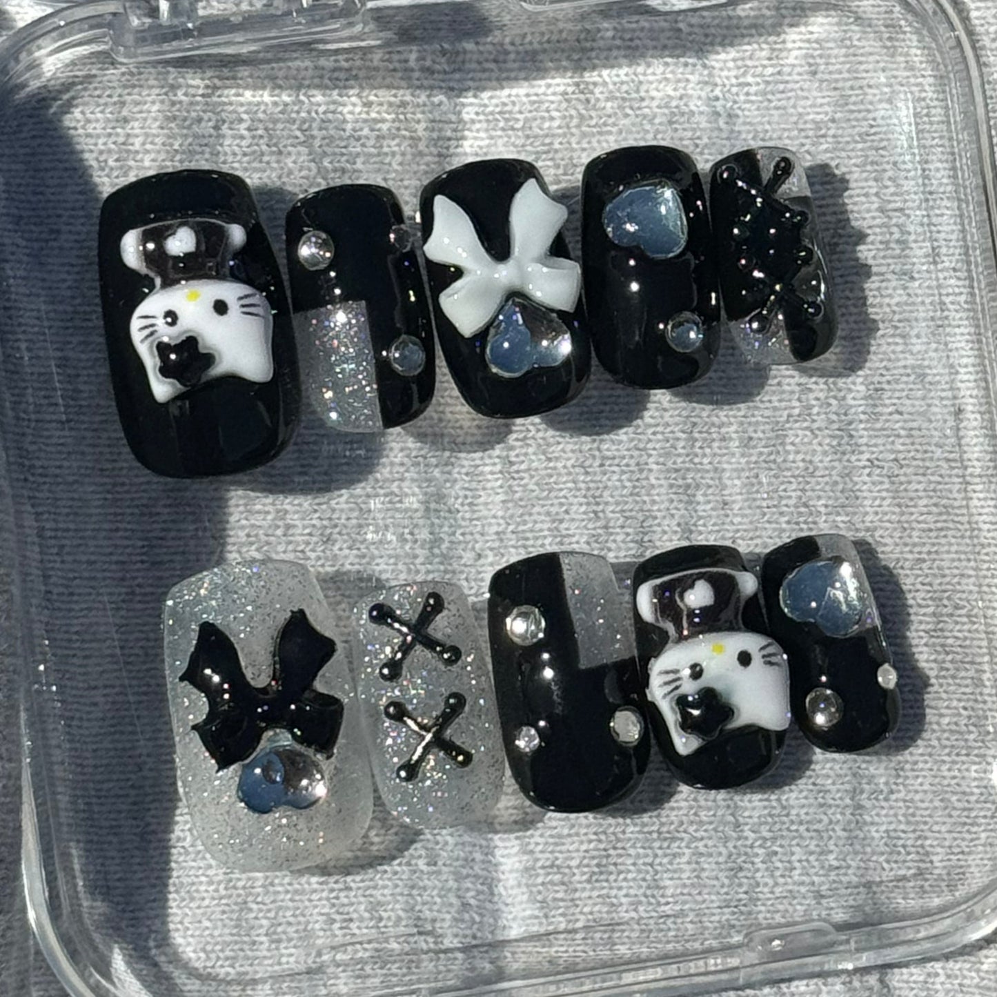 Hello Kitty black set.