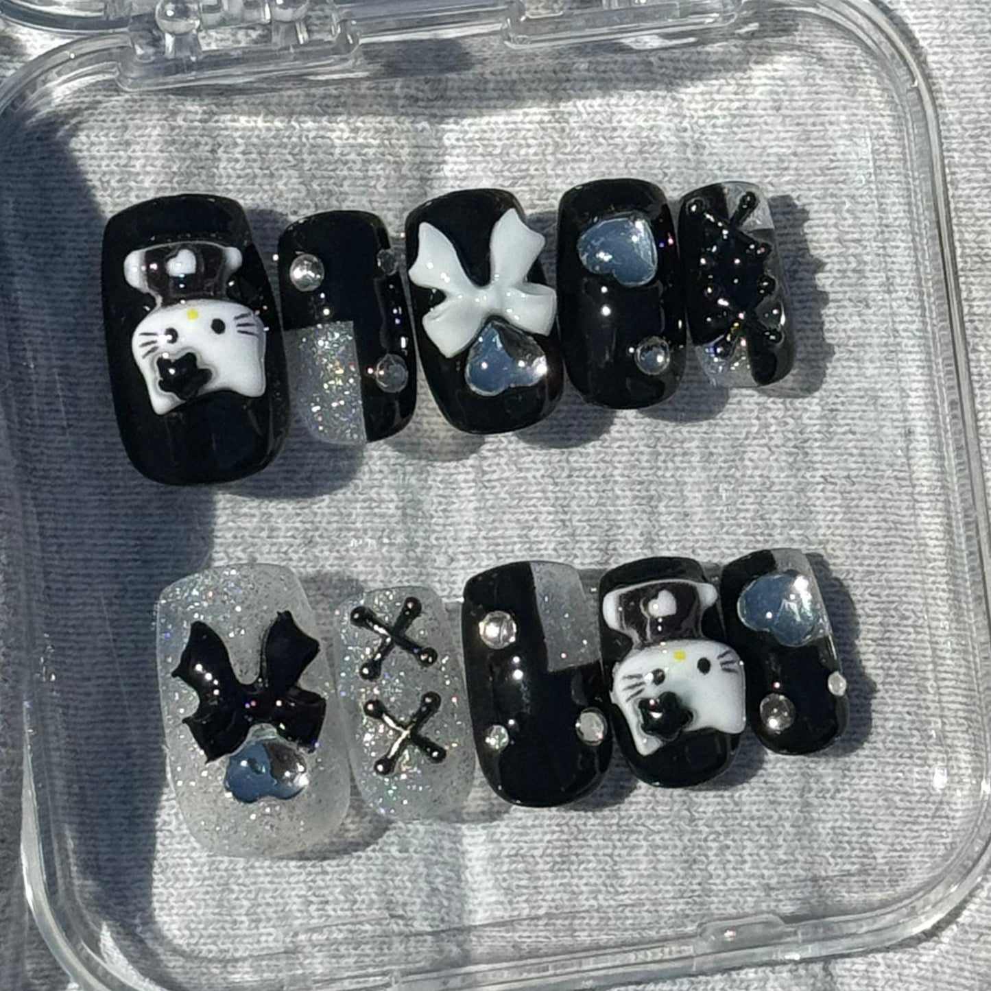 Hello Kitty black set.